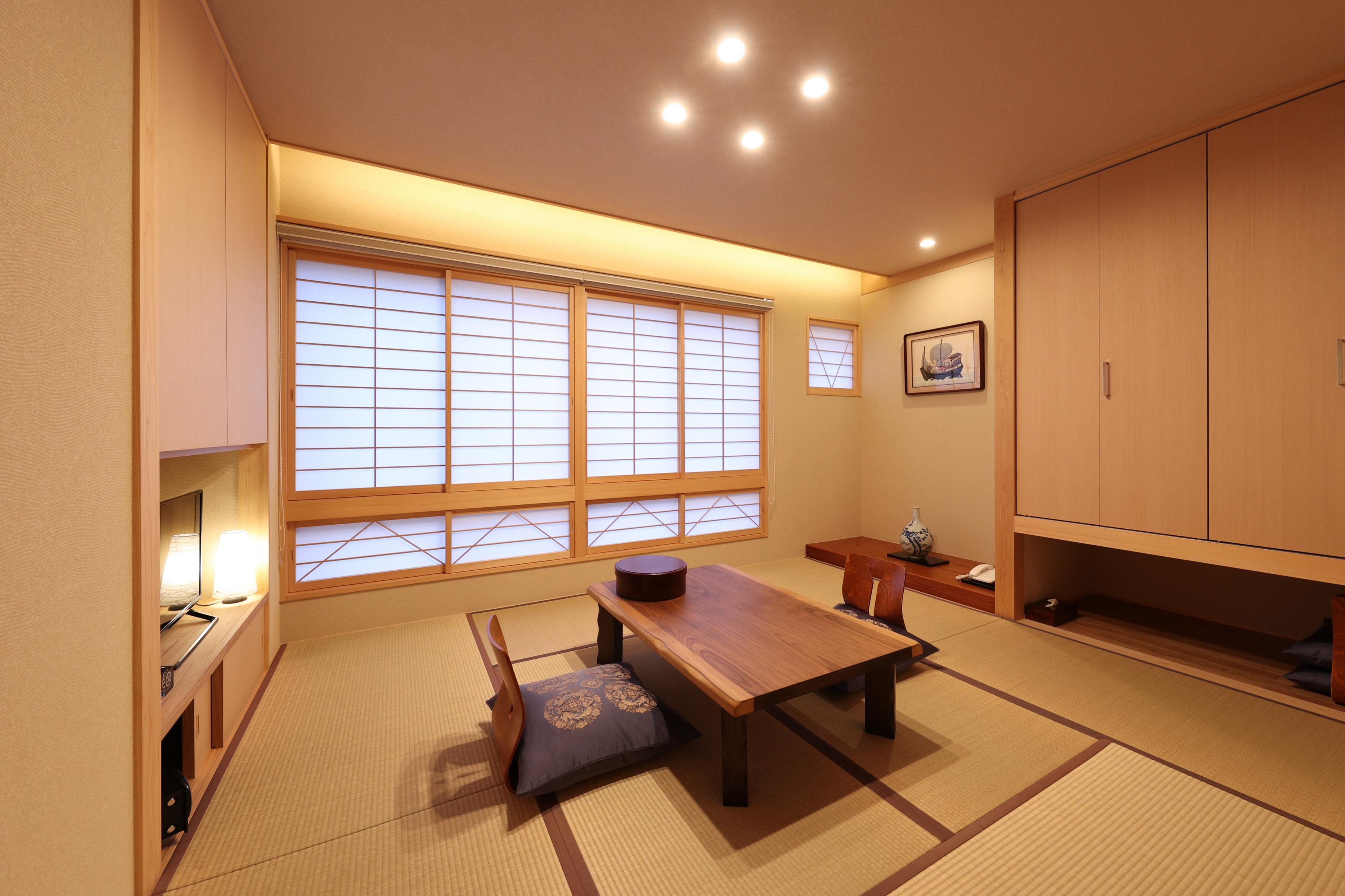 睦 館 2023年4月リニューアルの和洋室。シモンズ社製ベッドを採用しています。